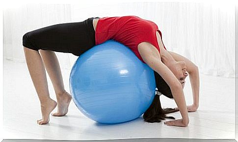 stretching with an exercise ball