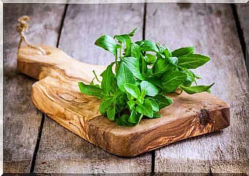 Basil on a cutting board.