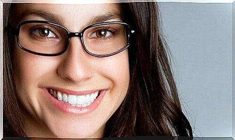 smiling woman with glasses