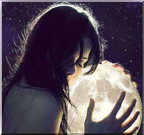 woman hugging the moon