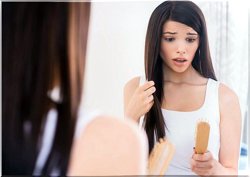 the woman is horrified to see her hairbrush